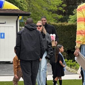 Awkward! Khloe Kardashian, Kylie Jenner, Tristan Thompson, Travis Scott and Blac Chyna put the drama aside and their children first as they celebrated their kids' graduating from pre-K in Los Angeles on Wednesday