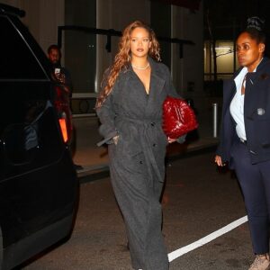 Fashion icon: All eyes were on the Diamonds hitmaker, 35, after grabbing a bite to eat while strutting to her car in a charcoal grey Dries Van Noten coat and a pair of towering Balenciaga shoes