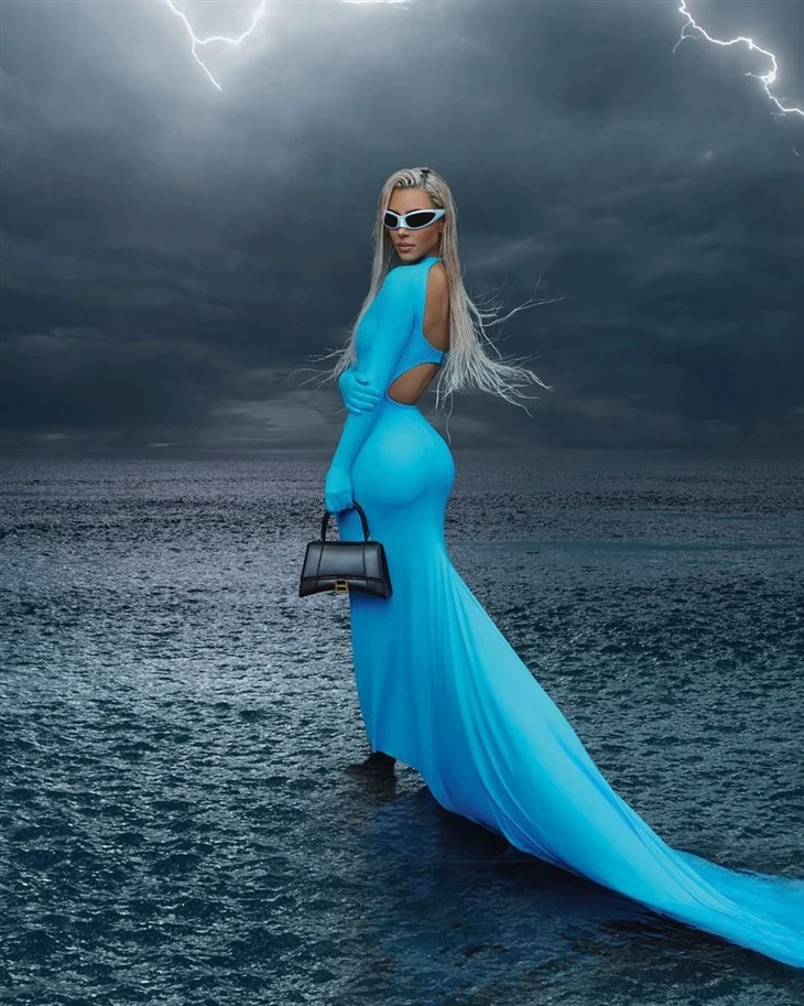 Kim Kardashian wears blue dress in Balenciaga winter 2022 campaign