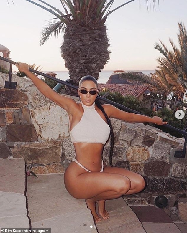 Golden goddess: Kim Kardashian was feeling nostalgic on Tuesday as she took to Instagram to share sizzling throwback snaps from her Cabo vacation