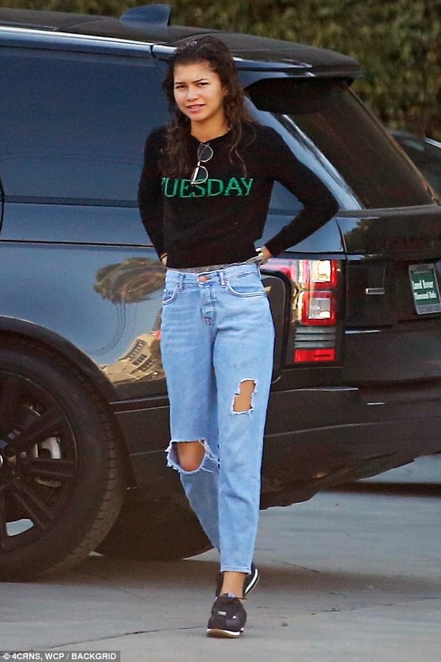 Out and about: Zendaya, 21, was snapped at Universal Studios in Universal City, California on Wednesday clad in a sweatshirt that read, 'Tuesday'