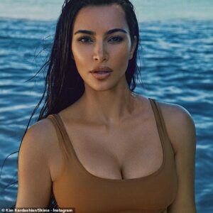 Best in the biz: Kim proved to be the perfect model as her solutionwear brand's official Instagram account shared two new images of the mogul, 41, rocking the latest designs