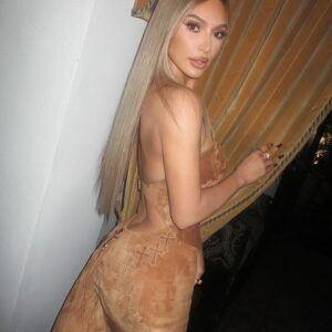 Kim Kardashian put on a cheeky display as she flashed her derriere in her latest risque Instagram snaps on Friday