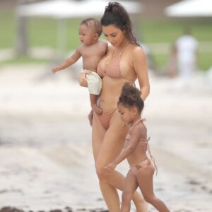 Kim Kardashian looks stunning in her nude mesh bikini