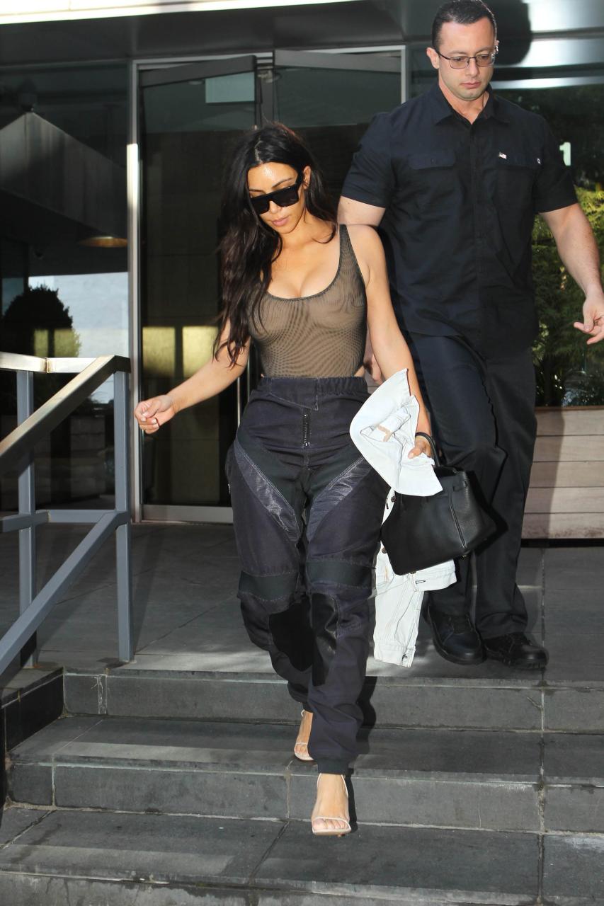  Kim was seen leaving her New York apartment in this plunging, sheer one piece