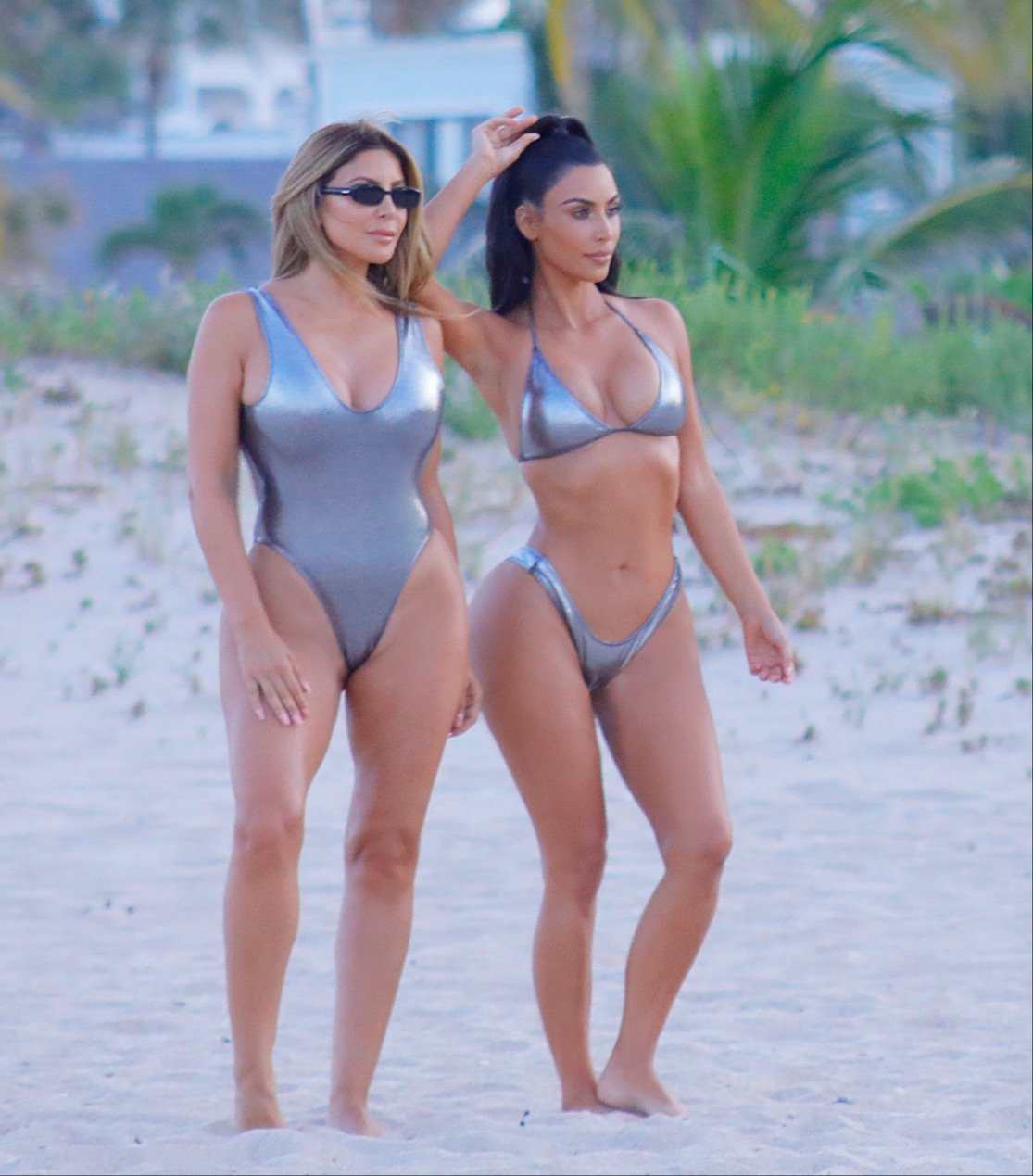 EXCLUSIVE: * EMBARGO: Strictly No Web / Online Permitted Before 9am BST 20th Aug 2018 * Fee For Online After 9am 500 GBP For Set * * Min Paper Print Fee 500 GBP PP * Premium Exclusive Kim Kardashian and Larsa Pippen seen wearing matching silver ʙικιɴι/swimsuit while on a pH๏τoshoot in MIami, FL Pictured: Kim Kardashian,Larsa Pippen Ref: SPL5016984 180818 EXCLUSIVE Picture by: AM / SplashNews.com * EMBARGO: Strictly No Web / Online Permitted Before 9am BST 20th Aug 2018 * Fee For Online After 9am 500 GBP For Set * * Min Paper Print Fee 500 GBP PP * Splash News and Pictures Los Angeles: 310-821-2666 New York: 212-619-2666 London: 0207 644 7656 Milan: +39 02 4399 8577 Sydney: +61 02 9240 7700 pH๏τodesk@splashnews.com World Rights