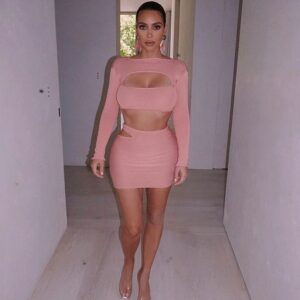 All dressed up and nowhere to go! Kim took a short break from posting some of her steamier content, but she was back at it earlier on Tuesday with photos of her pink bandage-style dress