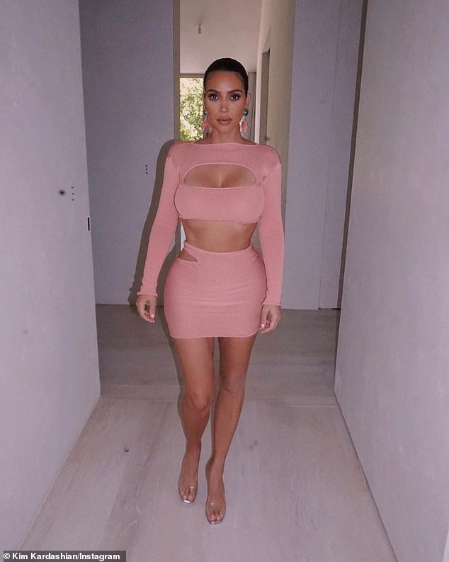 All dressed up and nowhere to go! Kim took a short break from posting some of her steamier content, but she was back at it earlier on Tuesday with pH๏τos of her pink bandage-style dress