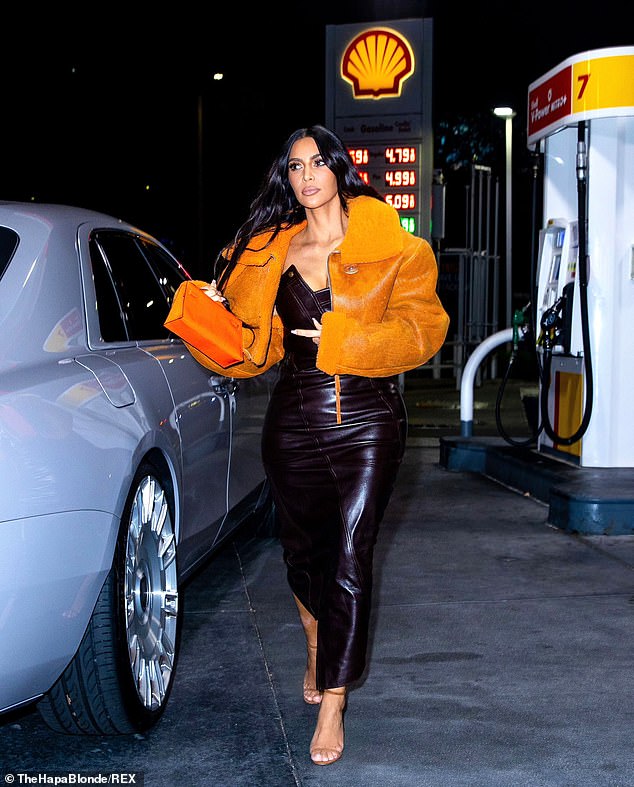 All dolled up: Kim Kardashian, 40, makes a late night snack run in a Dior dress and YEEZY jacket fashioned by ex-husband Kanye West amid reports she still 'worries' about dating again
