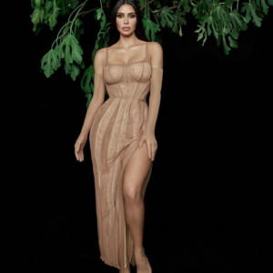 Kim Kardashian was accused of 'photoshopping' her latest sexy ad for KKW Fragrances